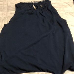 Sleeveless dark blue blouse